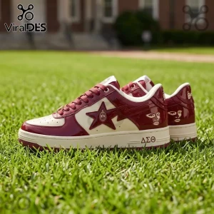 Maroon and cream patent leather sneakers with Delta Sigma Theta Greek letters and emblem on green grass.!