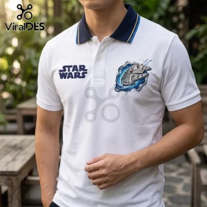 White polo shirt with Star Wars logo and Millennium Falcon graphic on the chest featuring a navy blue ribbed collar.!