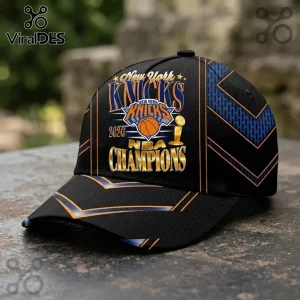 New York Knicks 2026 NBA Champions baseball cap with black fabric, blue and orange geometric accents, and gold lettering.!