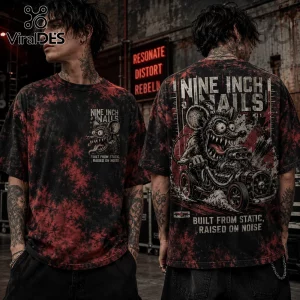 Nine Inch Nails graphic t-shirt with red and black tie-dye print, showing a rat driving a hot rod on the back.!