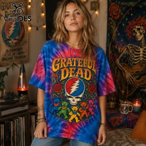 Grateful Dead All Night Long Tie Dye T-Shirt featuring colorful dancing bears, roses, and skull imagery on blue fabric.