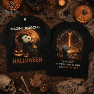 Imagine Dragons x Snoopy Halloween 2026 Black T-Shirt featuring Snoopy in a hood, pumpkins, and spooky forest graphics.