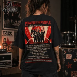 Black cotton t-shirt featuring Power to the People concert print with red and white graphic art and artist lineup text.!