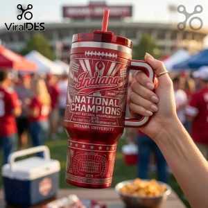 Red stainless steel Indiana University 2025 National Champions tumbler with straw, football stadium print, and handle.!