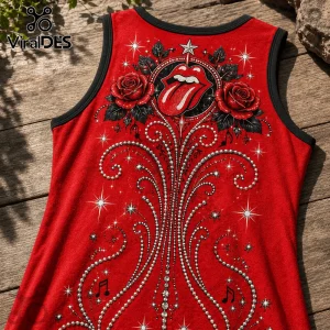 Red tank top with Rolling Stones tongue logo, red roses, and silver rhinestone swirl patterns on a wooden surface.!