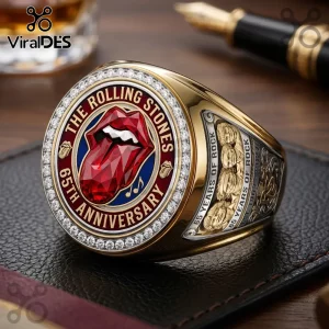 Gold championship ring featuring The Rolling Stones tongue logo, text reading 65th Anniversary, and diamond encrusting.!