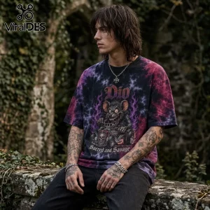Man wearing a purple and black tie-dye t-shirt featuring a rat driving a hot rod with the text Dio and Sacred and Savage.!