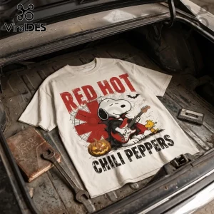 Red Hot Chili Peppers Snoopy Vampire Halloween T-Shirt featuring Snoopy playing guitar with Woodstock and a pumpkin.