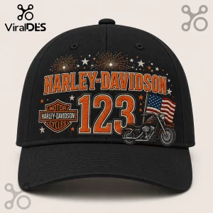 Harley-Davidson 123 Years Celebration black baseball cap with orange motorcycle graphic, American flag, and fireworks design.