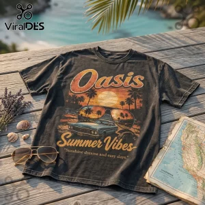 Vintage black t-shirt featuring a retro graphic of a classic car, palm trees, and sunglasses with text Oasis Summer Vibes.!