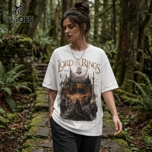 Woman wearing white oversized t-shirt with Lord of the Rings graphic featuring the One Ring, Barad-dûr, and Eye of Sauron.!