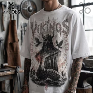 White oversized t-shirt featuring a black ink graphic of a Viking warrior, longship, ravens, and Norse rune text.!