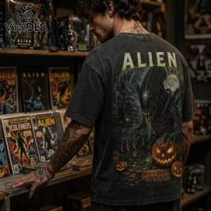 Alien Halloween Horror Pumpkin Acid Wash T-Shirt featuring a Xenomorph, glowing jack-o'-lanterns, and a spooky night scene.