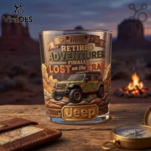Clear whiskey glass with 3D embossed Jeep SUV, desert landscape, and text Retired Adventurer Finally Lost on the Trail.!