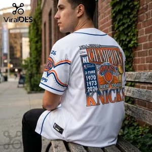 White New York Knicks baseball-style jersey featuring NBA Finals Champions graphics and 1970, 1973, 2026 text on back.!