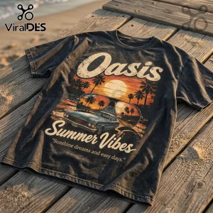 Charcoal grey vintage-wash t-shirt featuring a retro sunset, palm trees, sunglasses, and the text Oasis Summer Vibes.!
