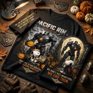 Pacific Rim x Snoopy Halloween Mecha Jaeger black t-shirt features a giant robot, Snoopy in a cape, and pumpkins.