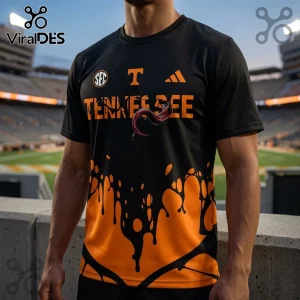 Black and orange Tennessee Volunteers athletic t-shirt with dripping paint graphic, SEC logo, and Adidas branding.!
