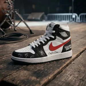 Custom Nike Air Jordan high-top sneaker in black, white, and red with My Chemical Romance text and signatures on wood floor.!
