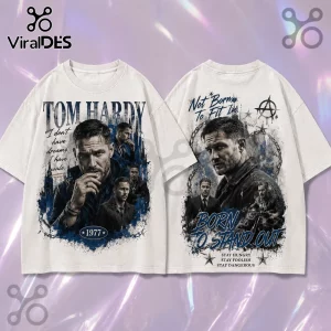 Tom Hardy Born To Stand Out T-Shirt featuring collage prints, blue graphics, quotes, and 1977 text on a white cotton tee.
