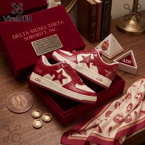 Delta Sigma Theta custom sneakers in crimson and cream with star logo, displayed in a branded velvet collector box.!