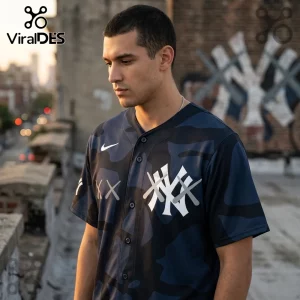 Man wearing a navy camouflage New York Yankees button-down baseball jersey with KAWS-style X eye motifs on the chest.!