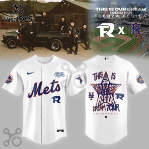Fuerza Regida and New York Mets collaboration white baseball jersey featuring blue and orange text and star graphic.!