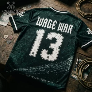 Wage War 2026 Australian Tour Crocodile Football Jersey featuring green reptile skin pattern, number 13, and white text.