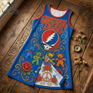 Blue sleeveless dress with Grateful Dead Steal Your Face logo, dancing bears, red roses, and a white peace sign lining.!