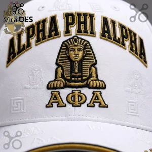 Alpha Phi Alpha Sphinx Premium White Baseball Cap with black and gold embroidered lettering and central sphinx emblem.
