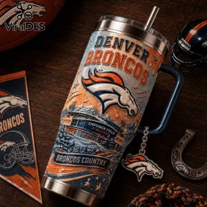 Denver Broncos 40oz Stanley Tumbler with handle featuring an Empower Field illustration, team logo, and orange-blue colors.