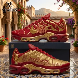 Spain National Team World Cup Air Max Plus shoes in red and gold with Spanish coat of arms and stadium motifs on a tile table.