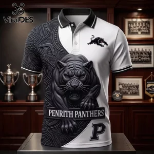 Penrith Panthers Mascot Black and White Polo Shirt featuring a 3D panther head, boomerang patterns, and team branding.