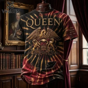 Queen The Show Must Go On tie dye t-shirt with gold band crest, distressed fabric edges, and red-black sunburst pattern.
