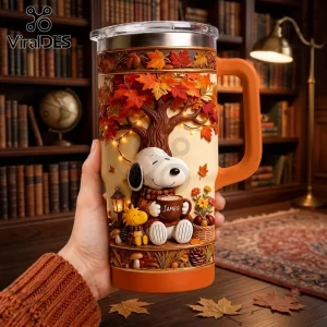 Snoopy Personalized Autumn Leaves Tumbler features Snoopy and Woodstock under a fall tree with a custom name mug.