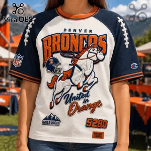 Denver Broncos 5280 Mile High embroidered shirt featuring a mascot, orange and navy colors, and football lace sleeve details.