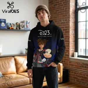 Disney x Kingdom Hearts Sora Sorcerer Mickey Hoodie in black featuring character graphics and D23 2026 event branding.