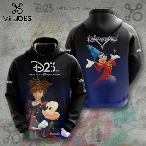 Disney x Kingdom Hearts Sora Sorcerer Mickey Hoodie featuring Sora on the front and Sorcerer Mickey on the back.