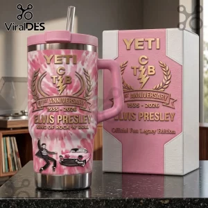 Elvis Presley 91st Anniversary Pink Stanley Tumbler with pink tie-dye pattern, logo, and classic car graphic on desk.