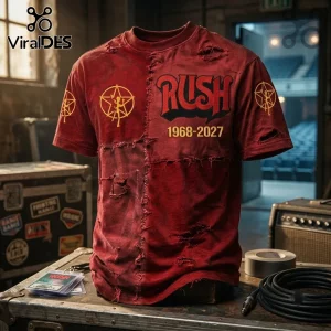 Rush 1968-2027 Distressed Red T-Shirt featuring gold Starman logos, worn-in fabric textures, and bold concert typography.