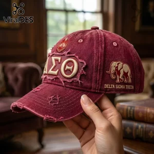 Delta Sigma Theta Red Distressed Baseball Cap featuring embroidered Greek letters, an elephant icon, and frayed edges.