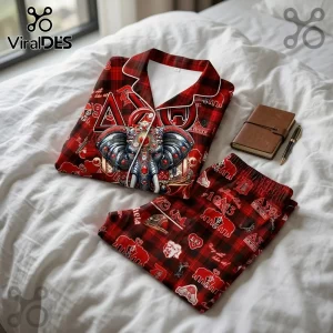 Delta Sigma Theta Red Plaid Elephant Pajama Set featuring Greek letters and ornate elephant graphics on a white bed sheet.