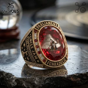 Parliament Funkadelic Mothership Red Gemstone Championship Ring featuring a metallic saucer and character inside a red gem.