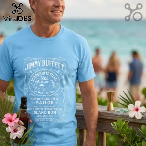 Jimmy Buffett Son of a Sailor blue t-shirt featuring a white screen-printed tropical rum label graphic on the chest.