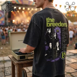 The Breeders Last Splash Alternative Rock shirt on a person standing at a portable record player at an outdoor concert.