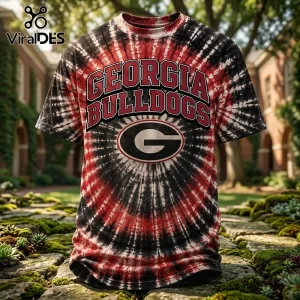 Georgia Bulldogs NCAA red and black tie dye shirt featuring collegiate text and the team G logo on a circular sunburst.