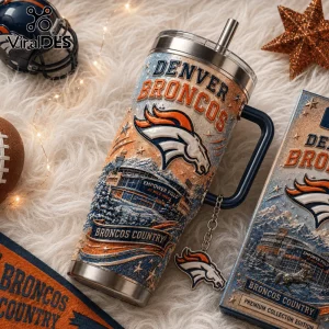 Denver Broncos 40oz Stanley Tumbler with Handle featuring team logo, stadium graphic, and blue metal accents on faux fur.