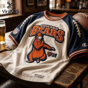 Chicago Bears Monsters of the Midway embroidered shirt in beige and navy with textured bear graphic on a wood table.