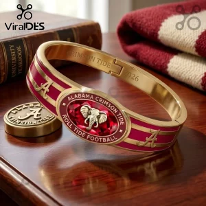Alabama Crimson Tide 2026 gold plated hinged bracelet with red enamel inlay, elephant logo, and engraved team lettering.
