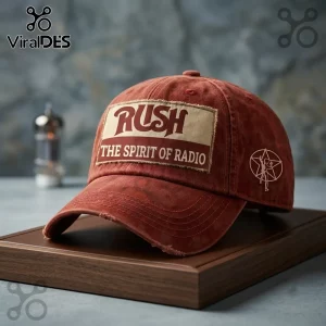 Rush The Spirit of Radio Red Distressed Baseball Cap featuring a rectangular patch and side starman logo on a wood base.